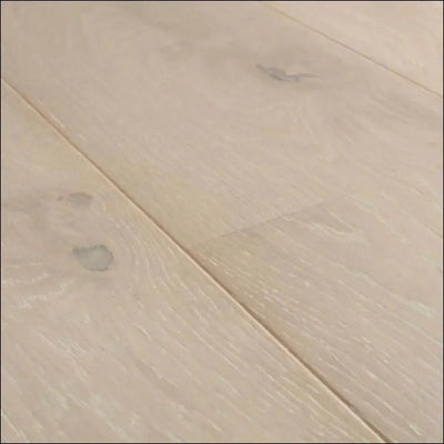Quick step cascada wood flooring in wintry forest oak extra matt with light hardwood planks and subtle grayish knots