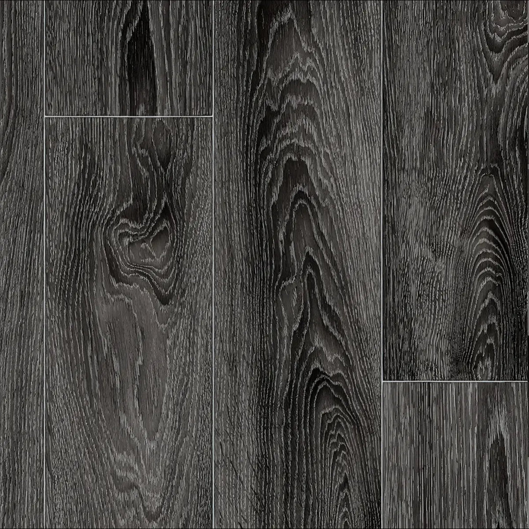 Dark gray caspien sheet vinyl flooring with realistic wood grain pattern and felt backed for comfort and durability