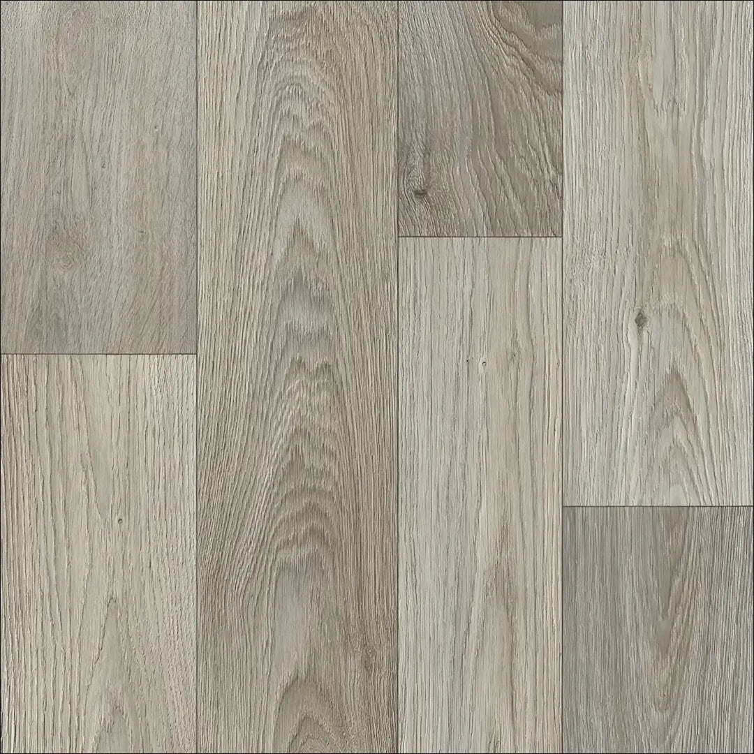 Gray wood-plank caspien sheet vinyl flooring with realistic wood grain and subtle knots felt backed for durability