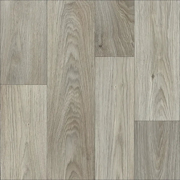 Gray wood-plank caspien sheet vinyl flooring with realistic wood grain and subtle knots felt backed for durability