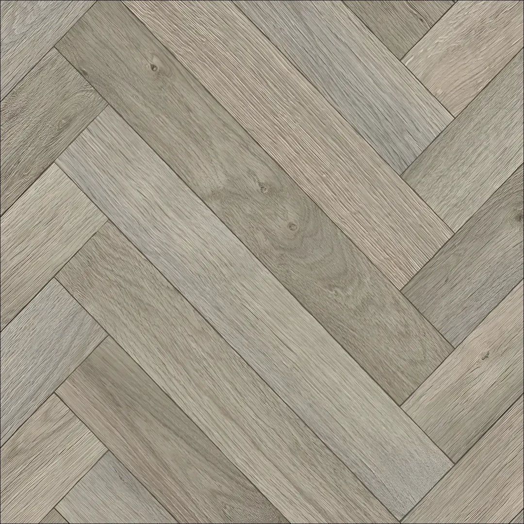 Gray wood-plank caspien sheet vinyl flooring with realistic wood herringbone pattern and felt backed design