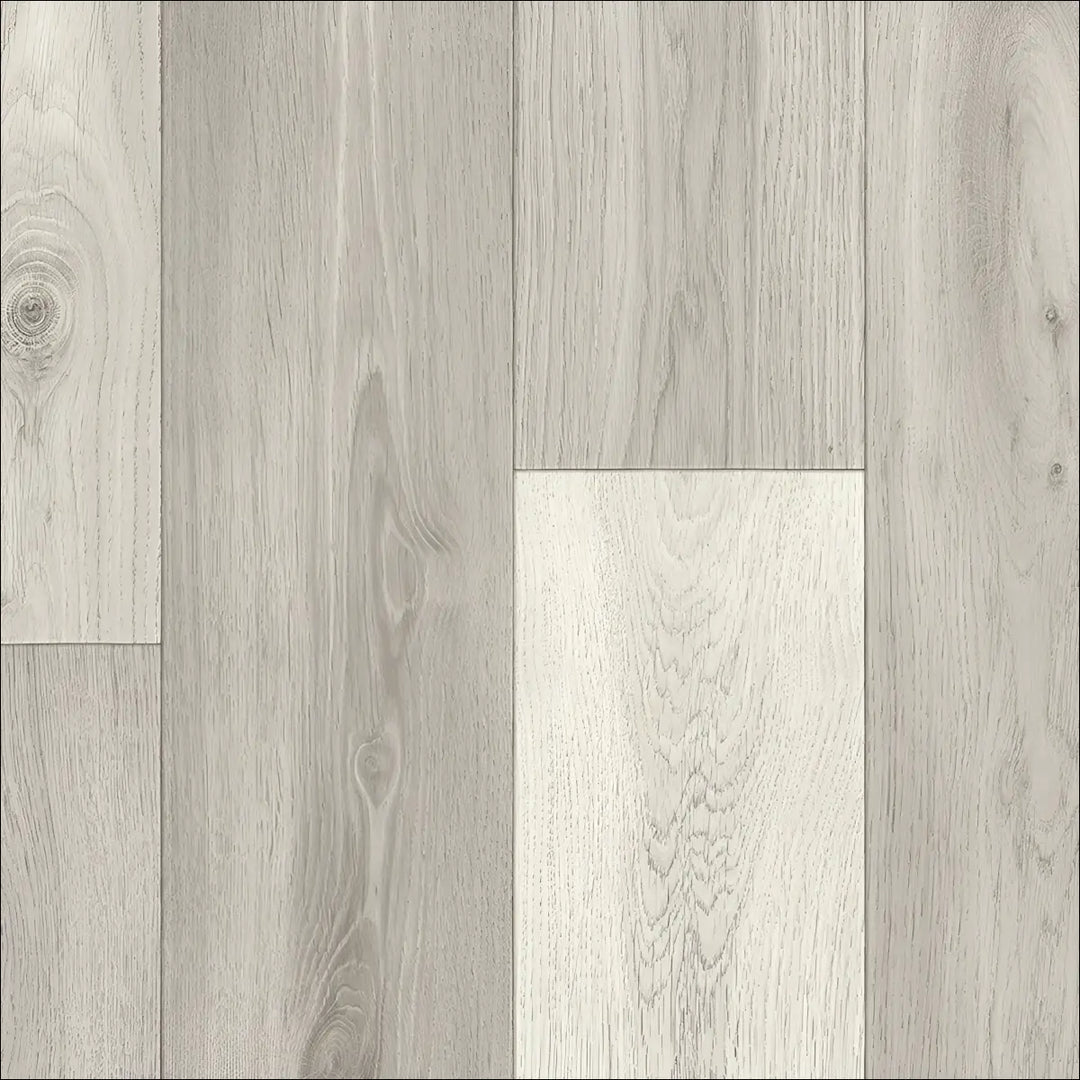Gray wood-look caspien sheet vinyl flooring with felt backed texture and realistic wood grain in light gray tones