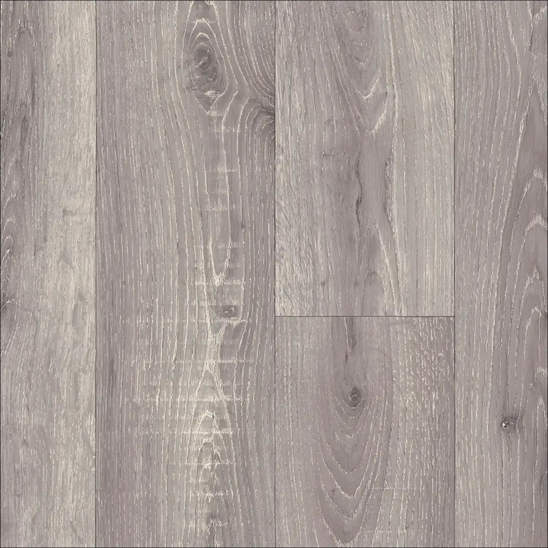 Gray caspien sheet vinyl flooring with realistic wood grain and subtle knots felt backed for easy installation