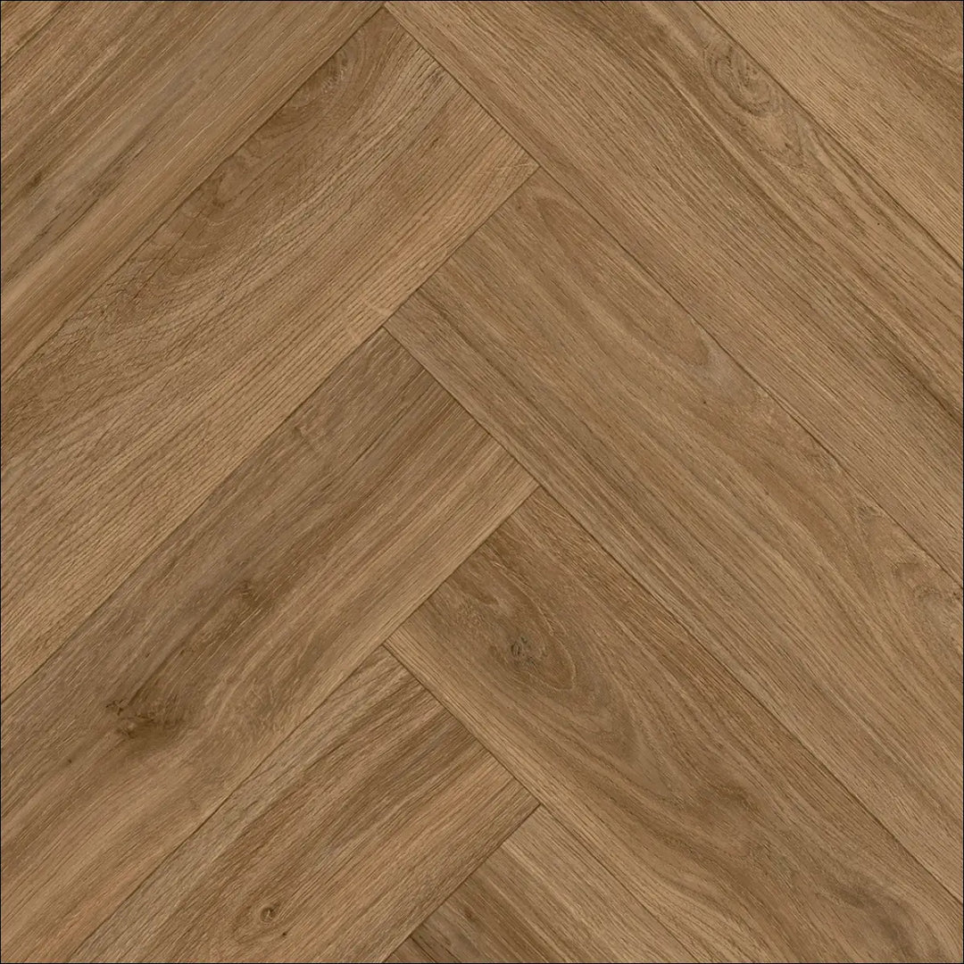 Light brown caspien sheet vinyl flooring with realistic wood herringbone pattern and felt backed for easy install