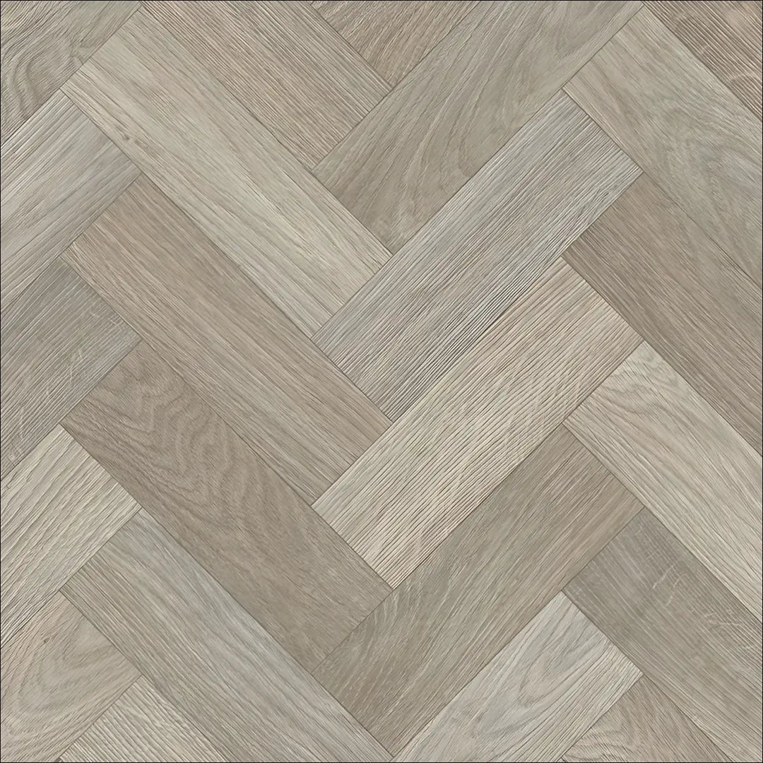 Gray wood-look herringbone caspien sheet vinyl flooring with realistic wood grain and felt backed for easy installation