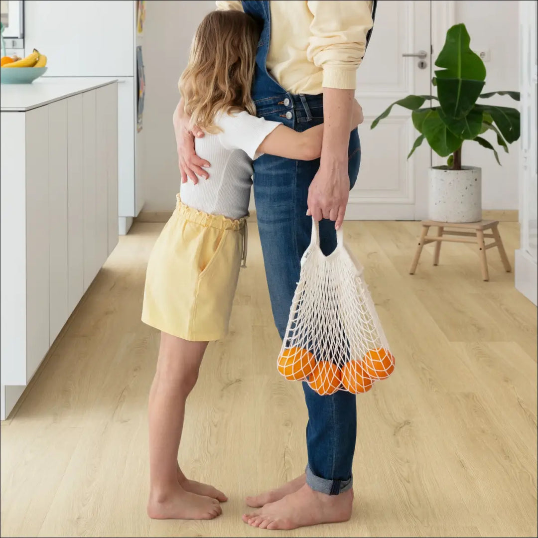 Quick Step Bloom Vinyl Botanic Beige Luxury Vinyl Flooring AVMPU40236 Father and Daughter