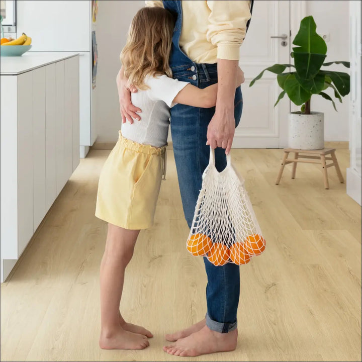 Quick Step Bloom Vinyl Botanic Beige Luxury Vinyl Flooring AVMPU40236 Father and Daughter