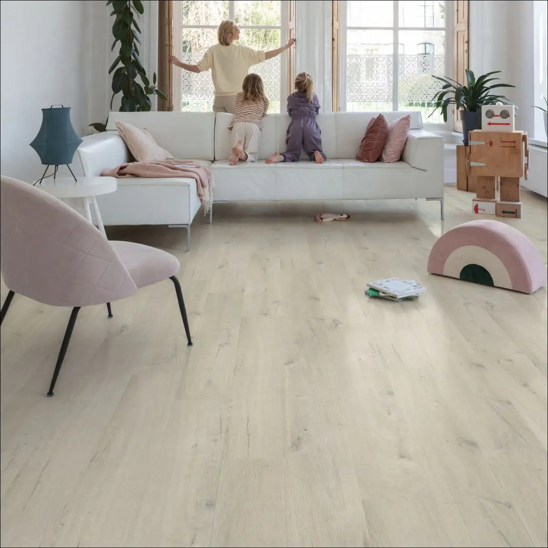 Quick Step Bloom Cotton Oak White Blush Luxury Vinyl Flooring AVMPU40200 Lounge with White Sofa