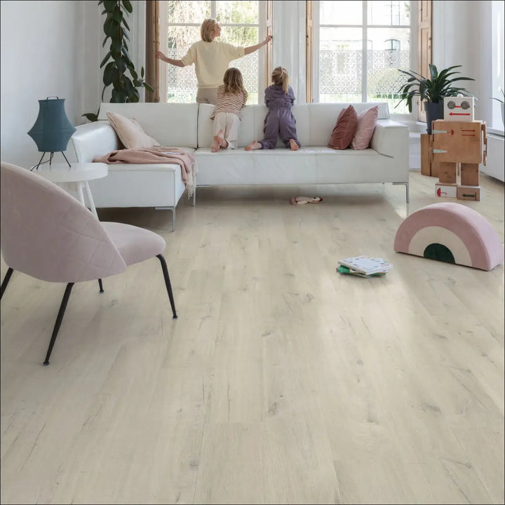 Quick Step Bloom Cotton Oak White Blush Luxury Vinyl Flooring AVMPU40200 Lounge with White Sofa