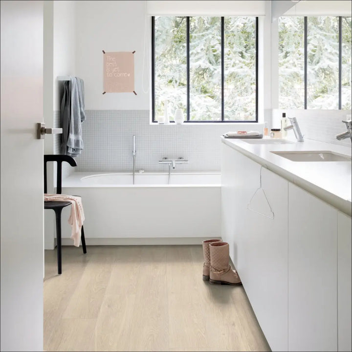 Quick Step Bloom Sea Breeze Oak Beige Luxury Vinyl Flooring AVMPU40080 in Bathroom