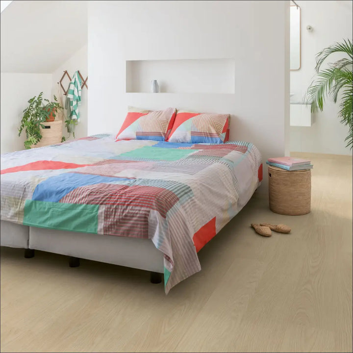 Quick Step Alpha Blos Buttermilk Oak Waterproof Luxury Vinyl Flooring | AVSPU40277 in Bedroom