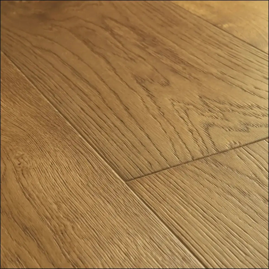 Light brown quick-step cala cinnamon oak extra matt hardwood flooring with natural wood grain pattern