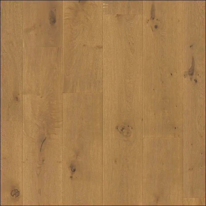 Light oak hardwood flooring with natural grain and subtle knots in quick-step cala dark chestnut oak extra matt finish