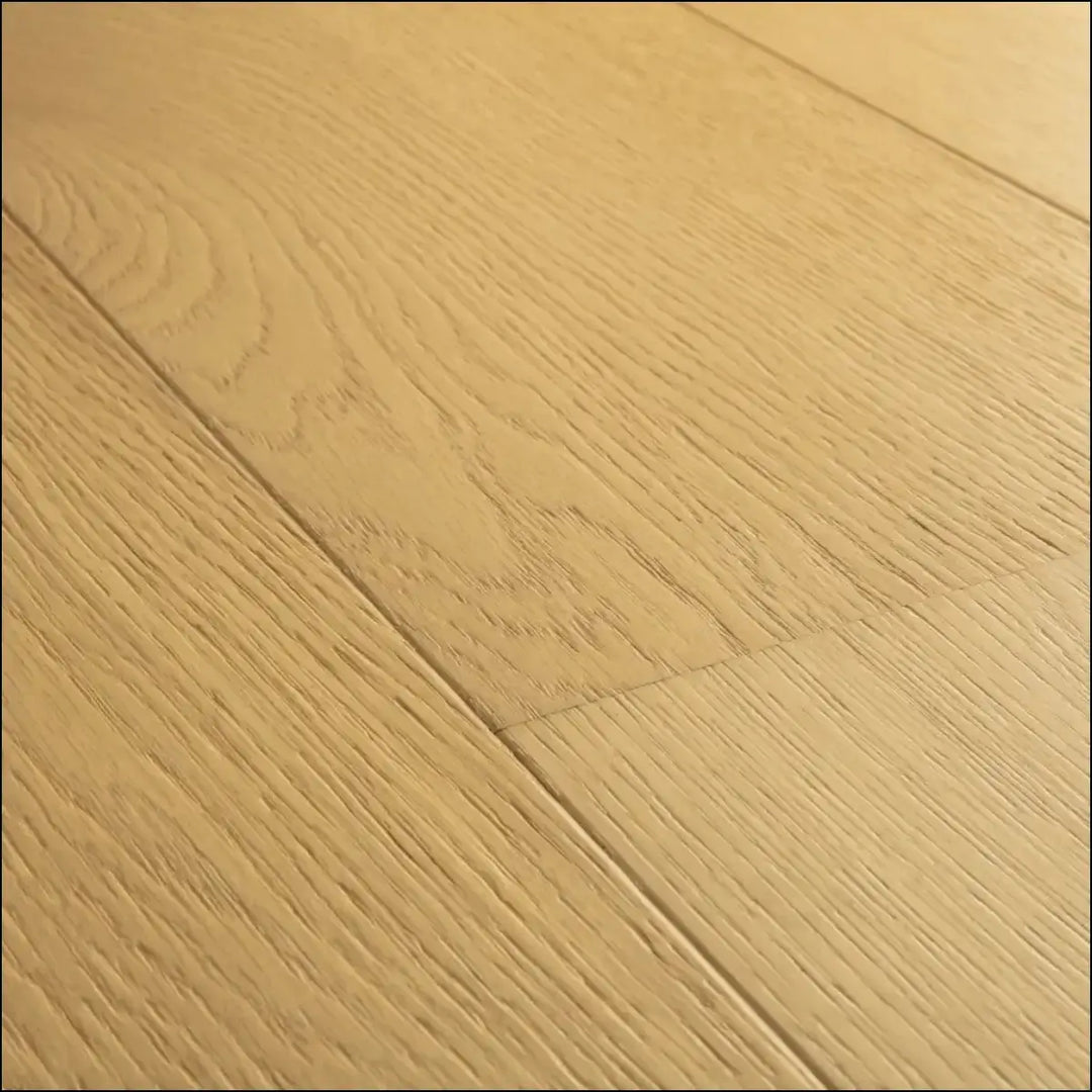 Light oak quick-step cala leather oak extra matt hardwood flooring showing natural grain and visible plank seams