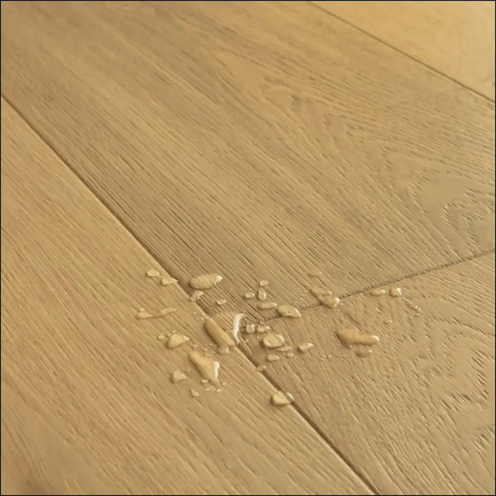 Light oak quick-step cala pure oak extra matt floor planks with natural grain pattern and visible seams oak extra matt cal5611