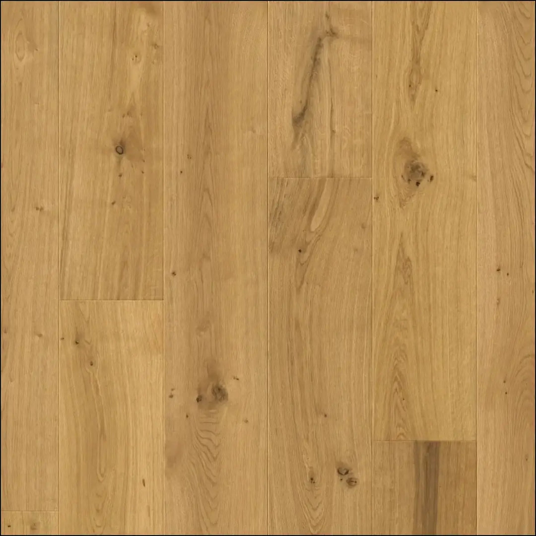 Light oak hardwood flooring with natural grain and subtle knots in quick-step cala sunrise oak extra matt finish