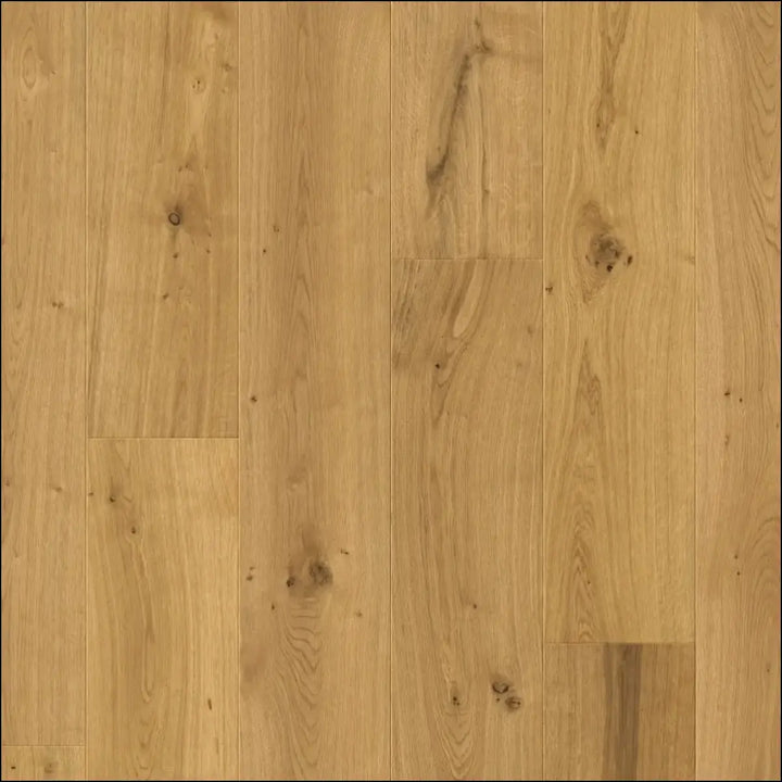 Light oak hardwood flooring with natural grain and subtle knots in quick-step cala sunrise oak extra matt finish