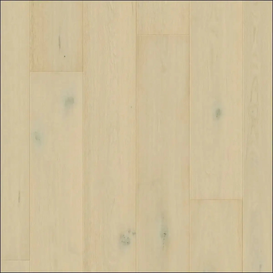 Light-colored quick-step cala wintry forest oak hardwood flooring with natural grain and subtle knots extra matt finish
