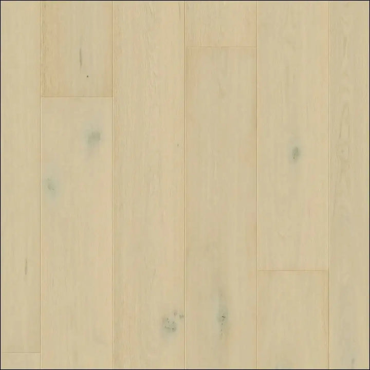Light-colored quick-step cala wintry forest oak hardwood flooring with natural grain and subtle knots extra matt finish
