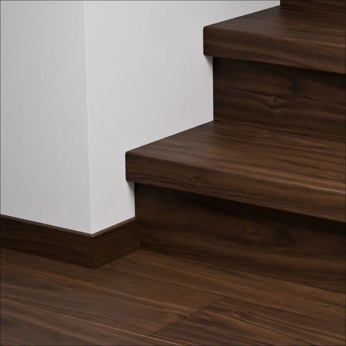 Dark brown wooden quick-step capture stair cover with sleek modern design and durable stair nosing for stylish stairs