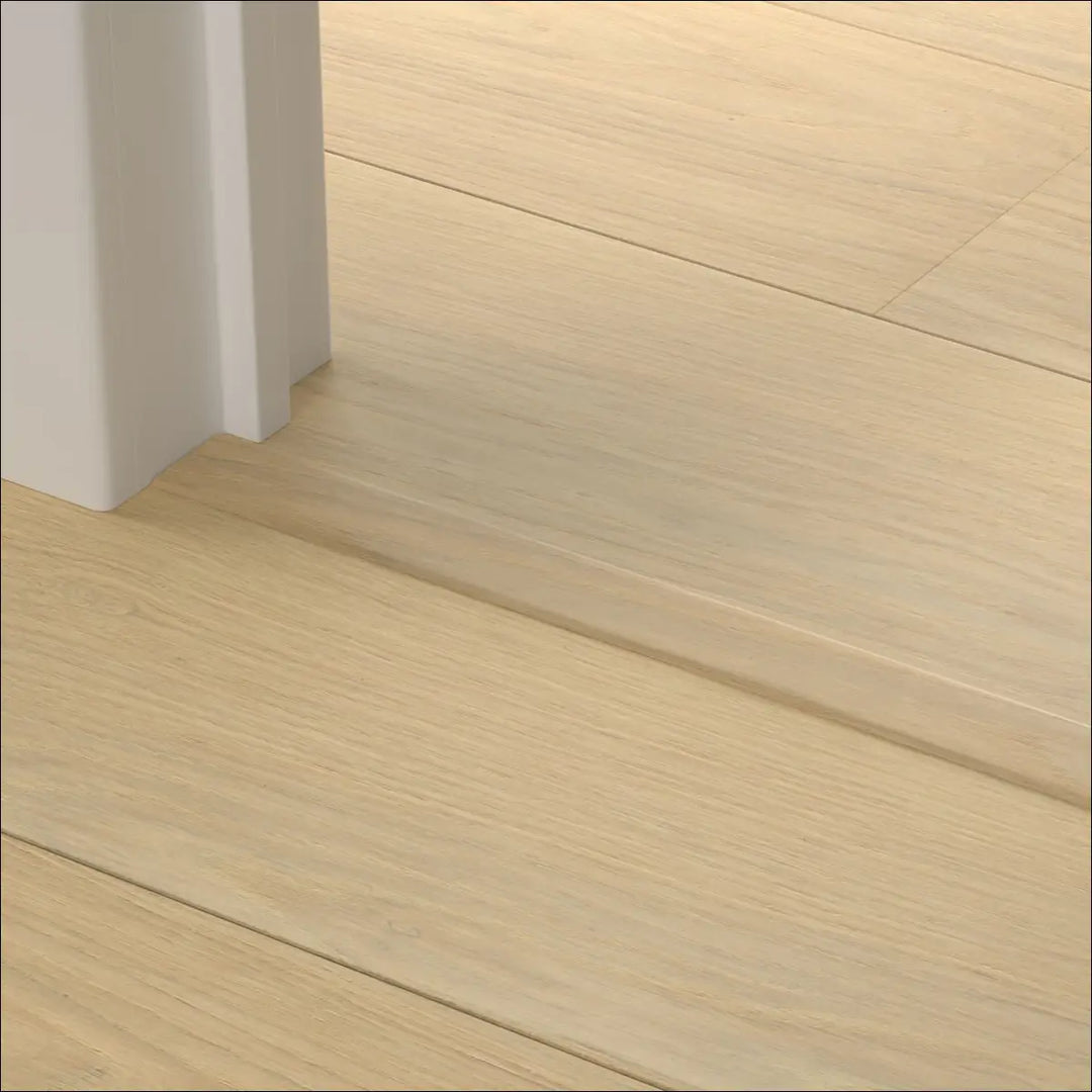 Light-colored wooden floor planks with subtle grain pattern from quick-step cascada incizo profile stair nosing