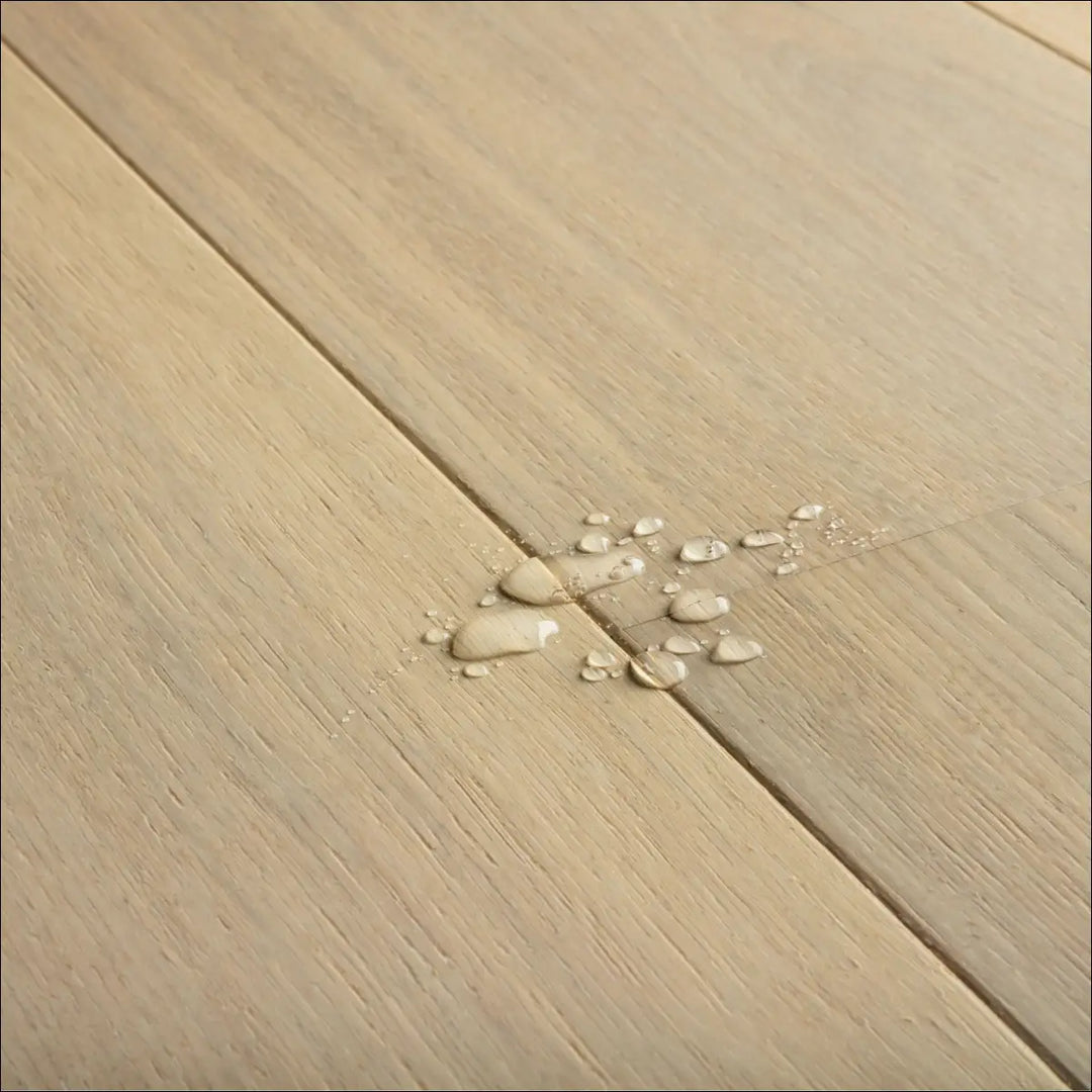 Quick Step Cascada Lily White Oak Extra Matt CAS5106 Water drops