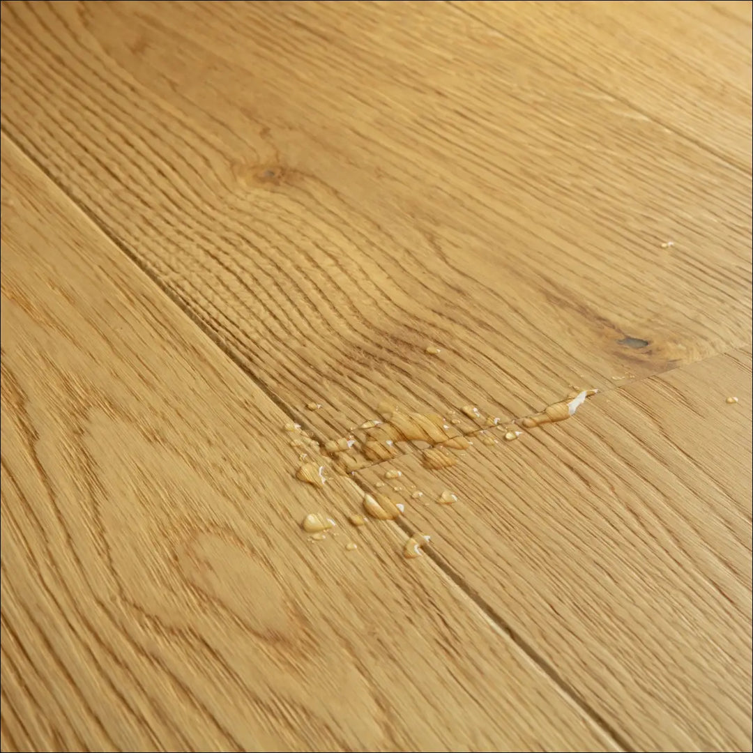 Quick Step Cascada Natural Oak Extra Matt Waterproof Engineered Wood Flooring CASC6032 Water Drops