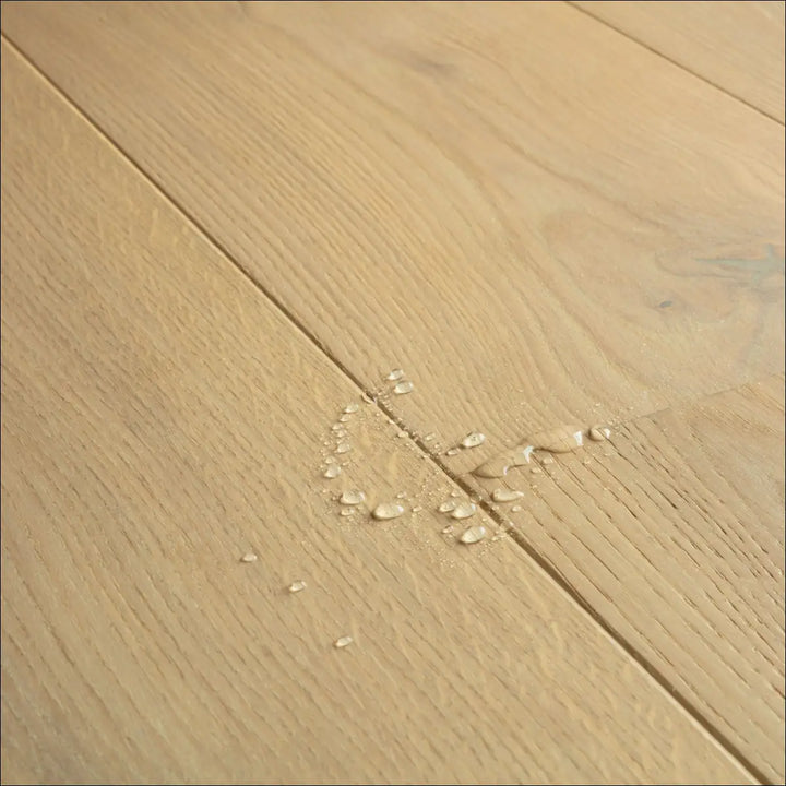 Quick Step Cascada Pearl White Oak Extra Matt CASC6030 Water Drops