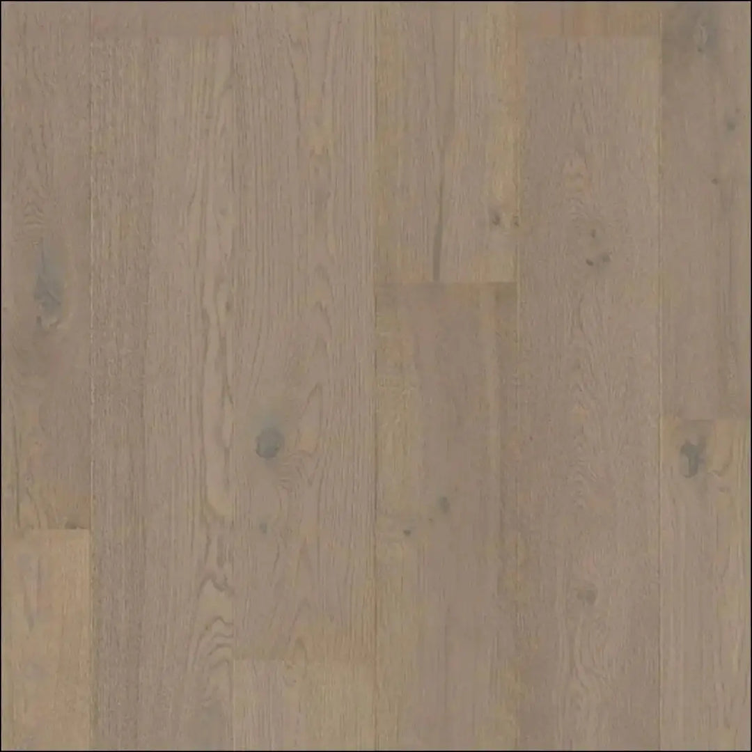 Light-colored cascada wood flooring in cotton grey oak with natural grain and knots from quick step cascada extra matt