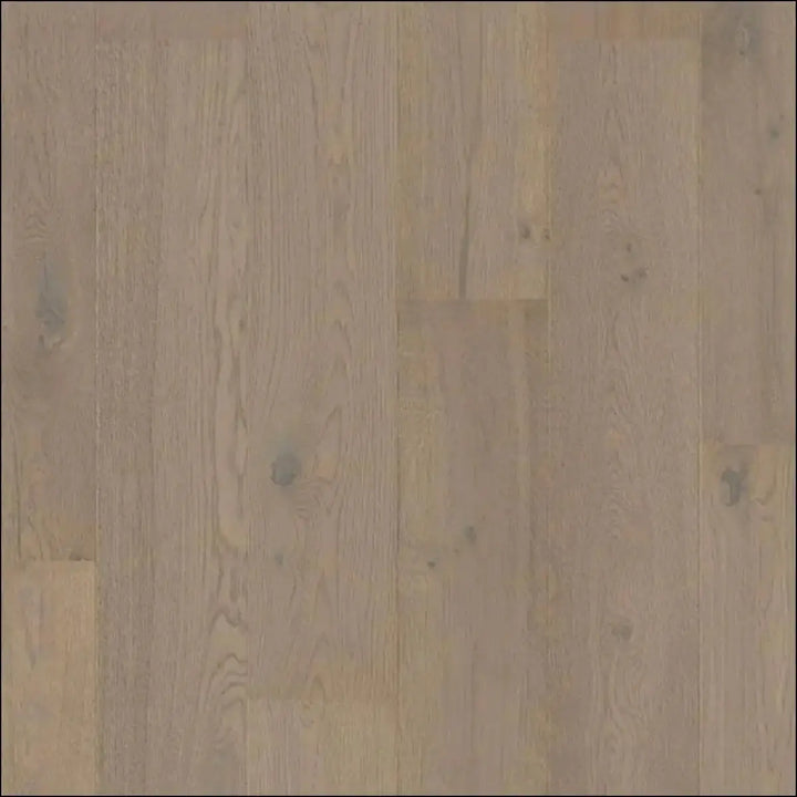 Light-colored cascada wood flooring in cotton grey oak with natural grain and knots from quick step cascada extra matt