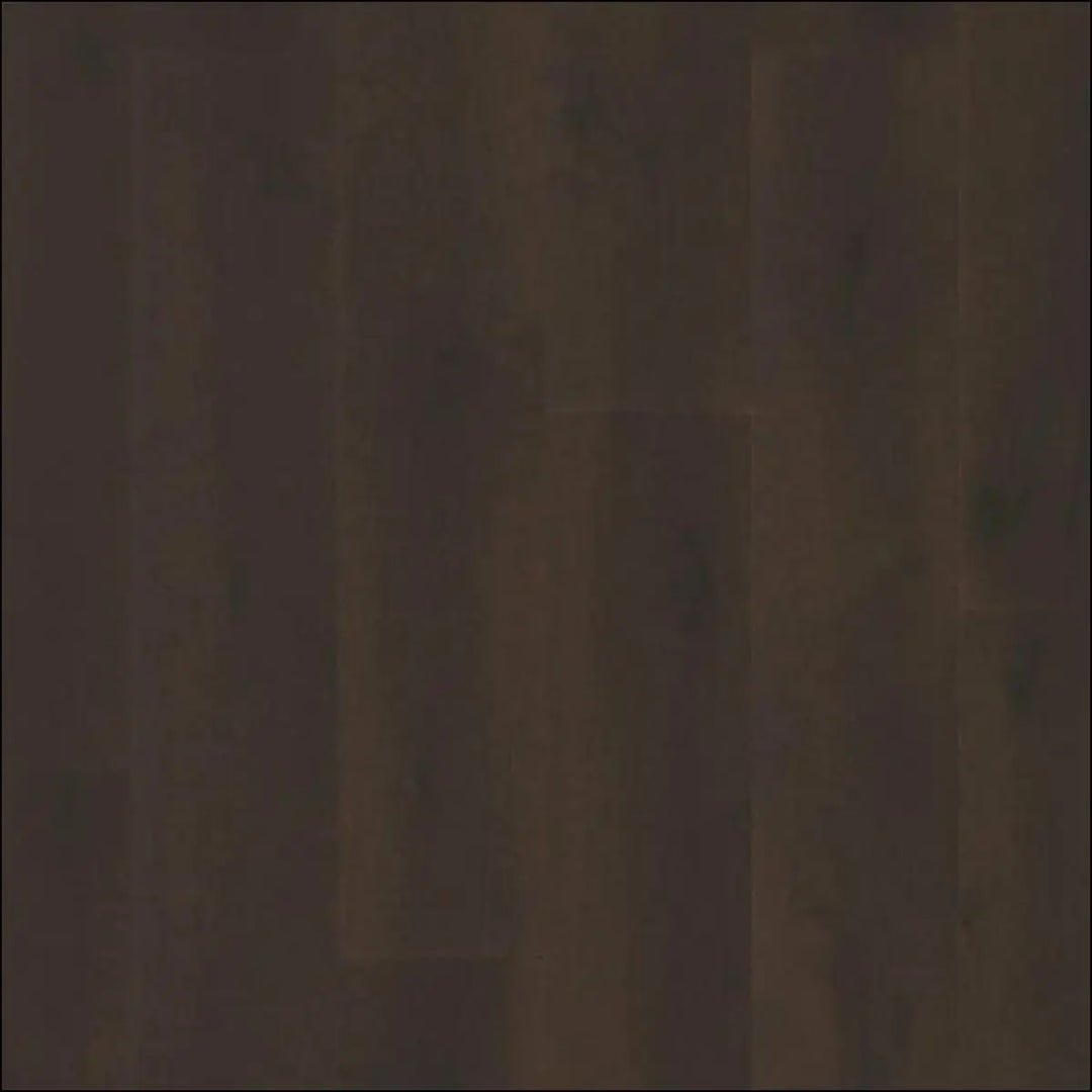 Dark brown cascada wood flooring with smooth matte finish and subtle grain patterns by quick step oak extra matt
