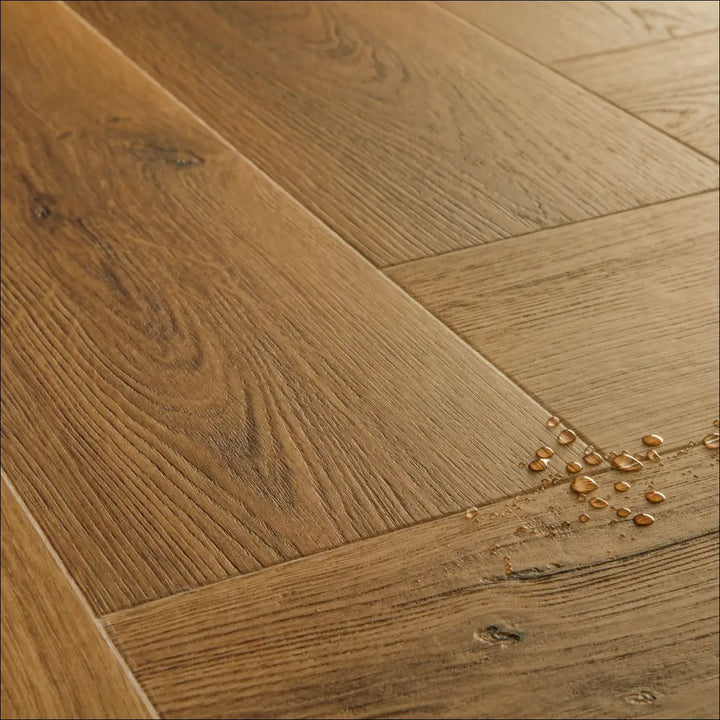 Quick Step Ciro Botanic Caramel Oak Herringbone Flooring AVHBU40364 Water Drops Shot