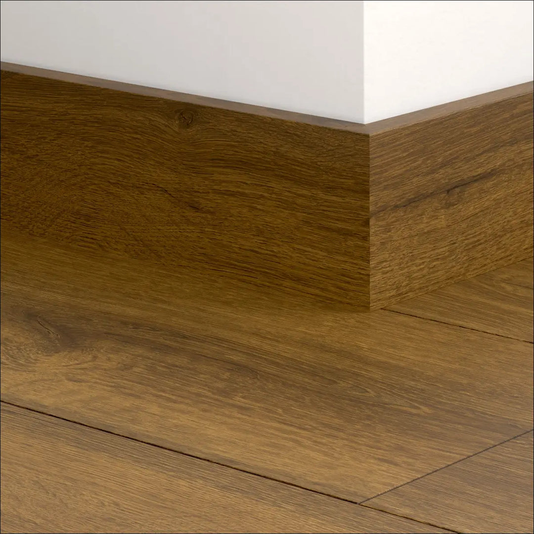 Brown wooden quick-step classic skirting boards 77mm with natural wood grain finish matching quickstep classic flooring