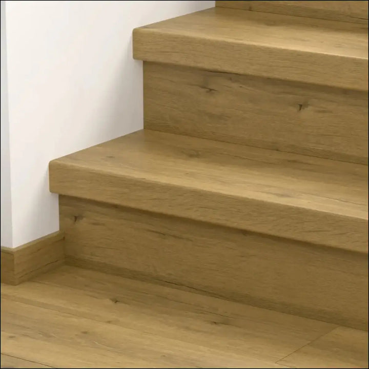 Light oak quick step classic stair cover with smooth natural grain finish perfect for classic laminate flooring stairs