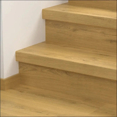 Light oak quick step classic stair cover with smooth natural finish and visible wood grain for classic laminate flooring