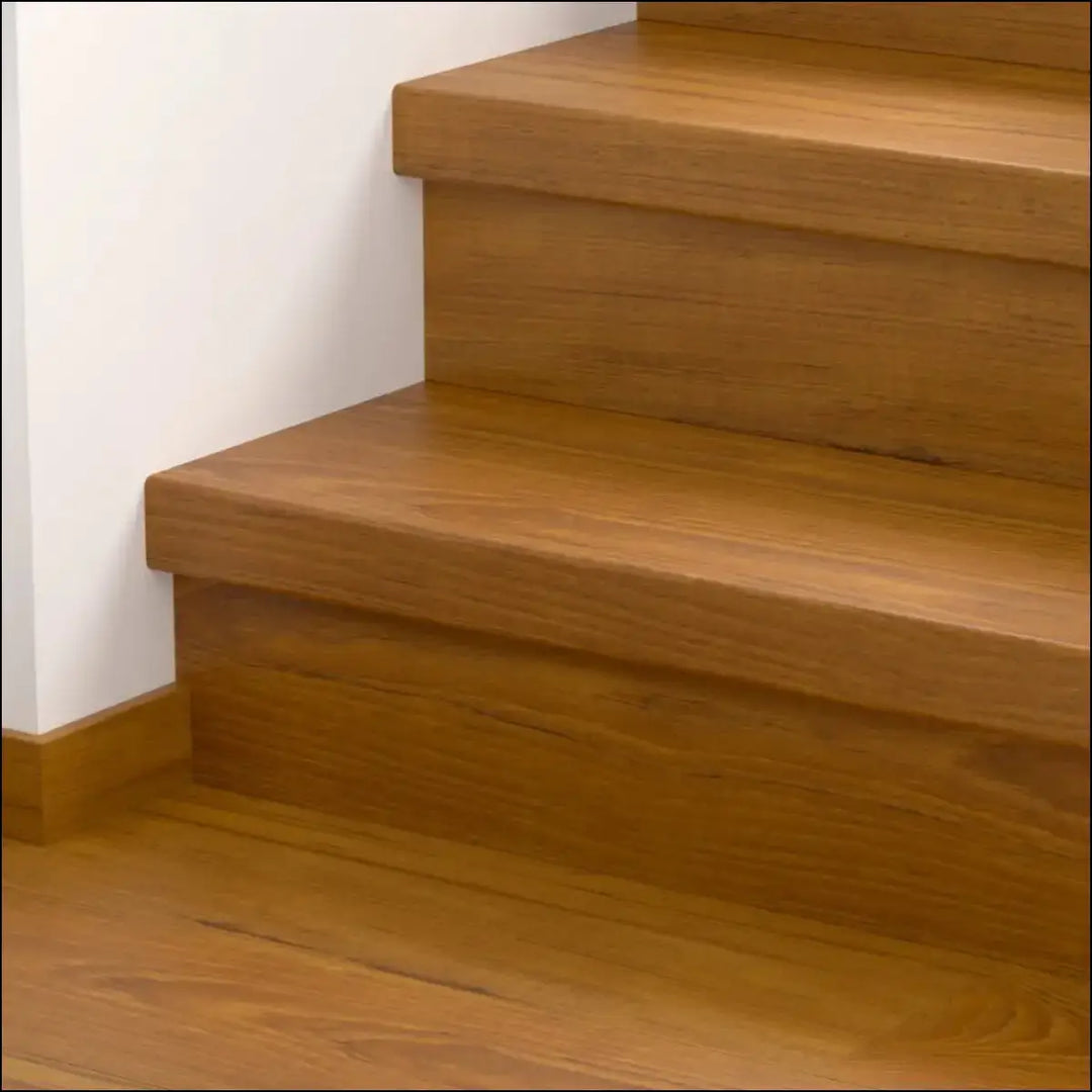 Modern wooden staircase with warm natural finish featuring quick step classic stair cover in classic laminate flooring style