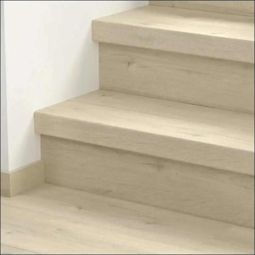 Light beige quick step classic stair cover with smooth modern finish on wooden stairs for classic laminate flooring