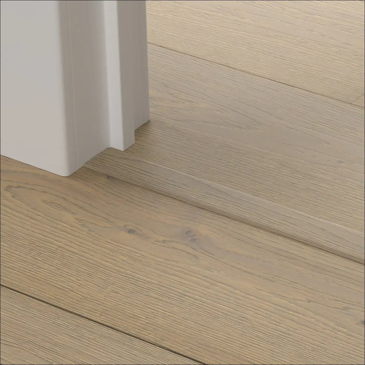 Light beige quickstep disegno engineered wood-plank flooring with subtle natural grain in disegno incizo profile