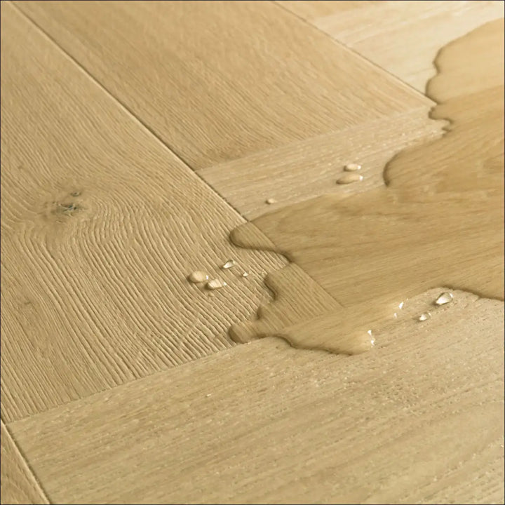 Quick step impressive design cardamom oak imd8242 hardwood floor in light oak with scratch guard and natural wood grain knots