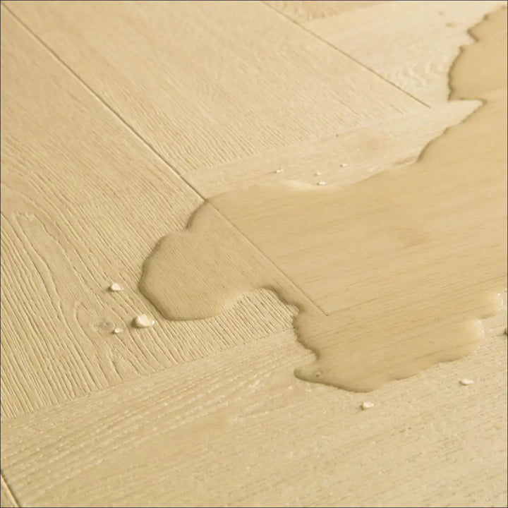 A shallow pool on quick step impressive design ginger oak scratch guard oak floor with light beige wood grain texture