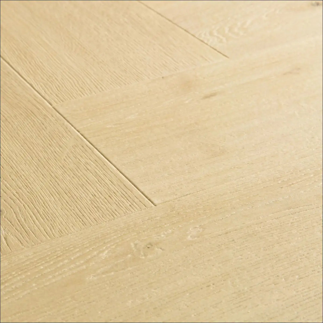 Light-colored quick step impressive design ginger oak hardwood flooring with natural wood grain and scratch guard oak finish