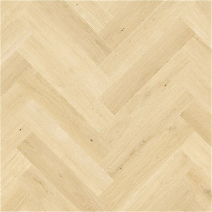 Light-colored hardwood flooring in quick step impressive design ginger oak with scratch guard oak herringbone pattern