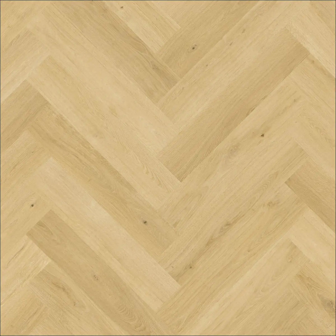 Light-colored quick step impressive design nutmeg oak laminate flooring with herringbone pattern and scratch guard protection