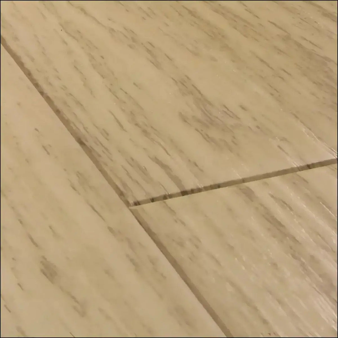 Quick step impressive laminate flooring white varnished oak