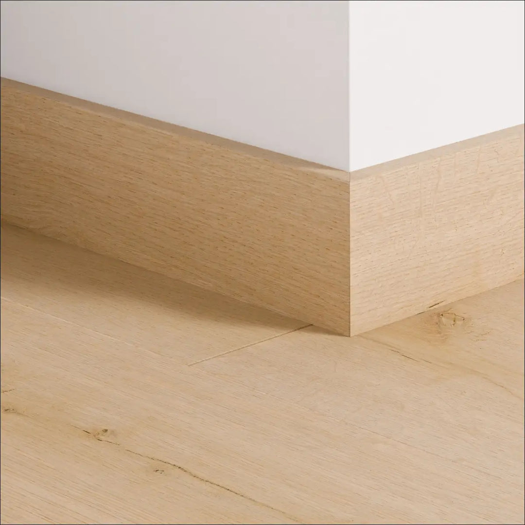 Light oak quick-step skirting board with smooth natural wood grain finish impressive 77mm skirting for walls