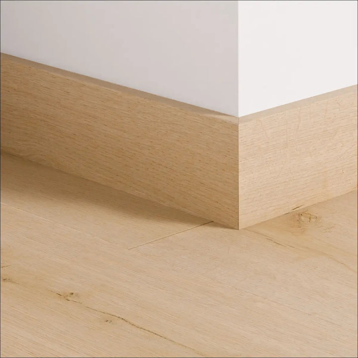 Light oak quick-step skirting board with smooth natural wood grain finish impressive 77mm skirting for walls