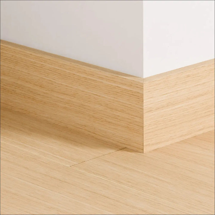 Light oak quick-step impressive 77mm skirting board with smooth natural grain finish for stylish baseboard use