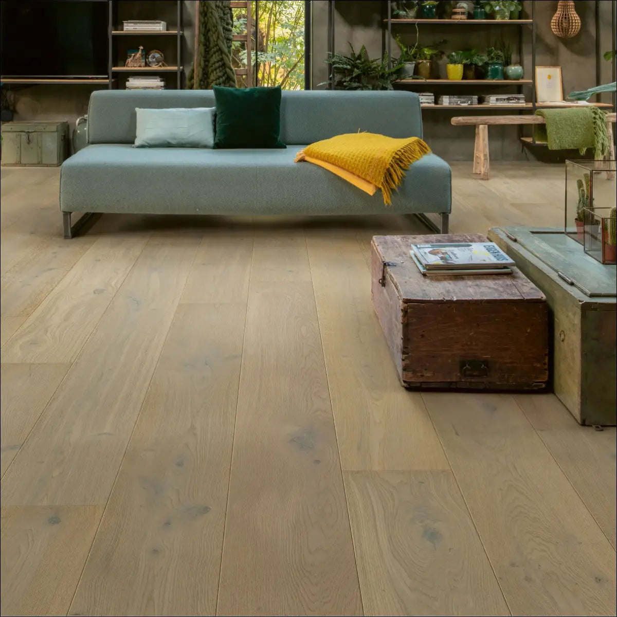 Light gray wood plank flooring with a natural rustic finish quick step massimo white daisy oak extra matt