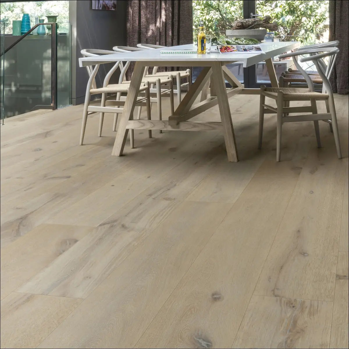 Light-colored quick step massimo winter storm oak extra matt oiled wood plank flooring with subtle natural grain pattern