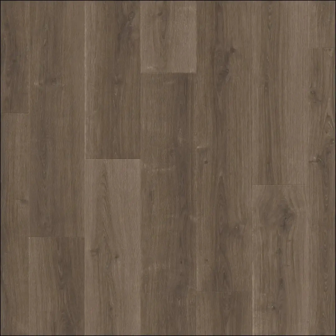 Gray wood-plank laminate flooring with natural grain and tone variations from quickstep capture laminate brushed oak brown